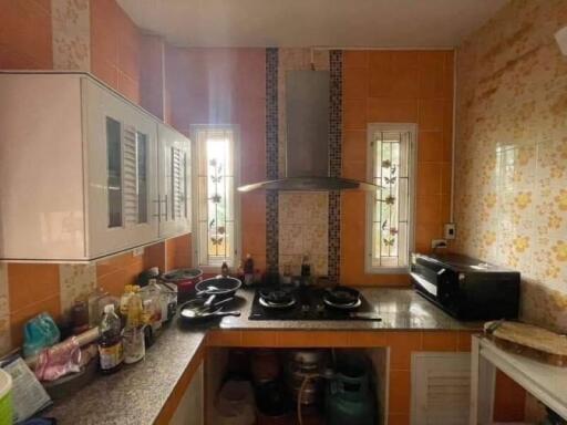 Kitchen with countertop and cooking appliances