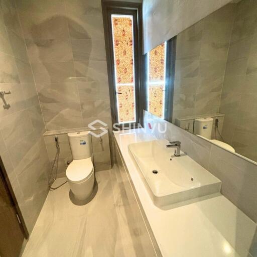 Modern bathroom with sink and toilet