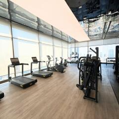 Spacious gym with modern equipment