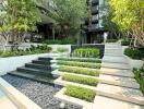 Modern outdoor area with greenery and tiered steps