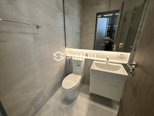 Modern bathroom with toilet and sink