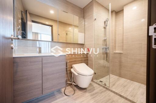 Modern bathroom with glass shower and vanity