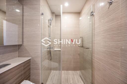 modern bathroom with glass-enclosed shower