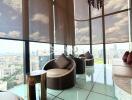 Stylish high-rise lounge with panoramic city views