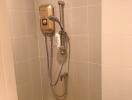 Bathroom shower area with water heater