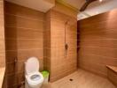 Modern bathroom with wood-style tiles and walk-in shower