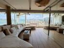 Spacious living room with panoramic city and water views