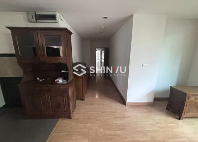 Hallway with wooden furniture