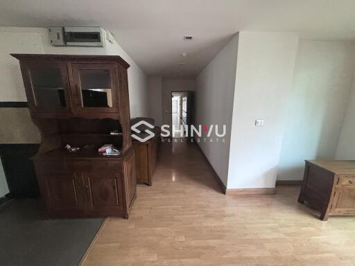 Hallway with wooden furniture