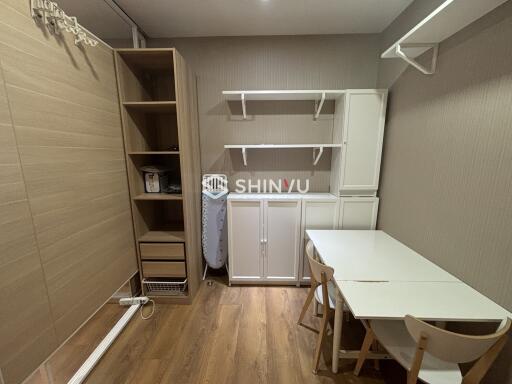 Bedroom with storage and workspace