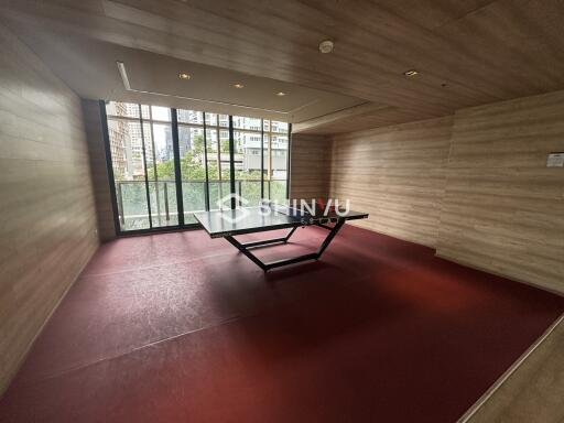 Table tennis in a recreation room