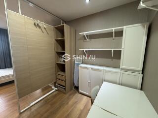 Bedroom with wardrobe and study area