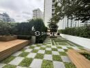 Modern outdoor communal area with greenery and seating