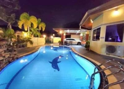 Outdoor swimming pool area at night