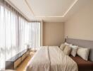 Modern bedroom with large windows and natural light