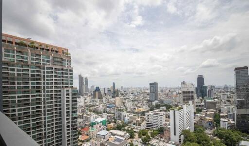 City skyline view from a high-rise apartment