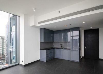 Modern apartment kitchen with a view of the city