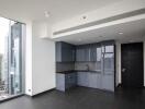 Modern apartment kitchen with a view of the city