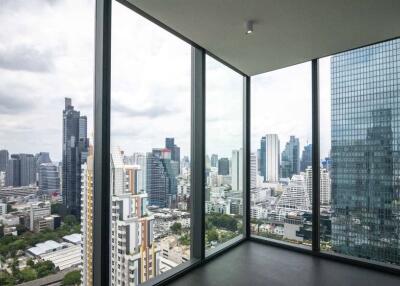 High-rise corner window view of city skyline