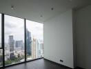 Living room with large windows and city view