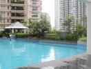 Outdoor swimming pool with adjacent buildings