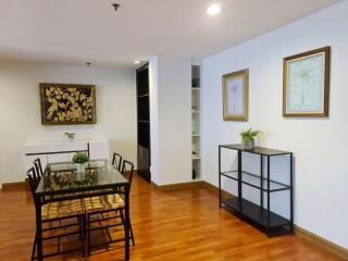 Modern dining area with wooden flooring