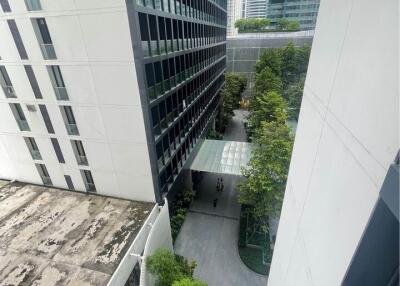 View of modern buildings with green outdoor area