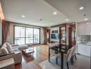 Modern living room with dining area and kitchen