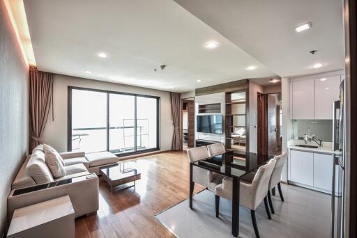 Modern living room and dining area with open kitchen