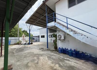 Outdoor area with staircase and water tanks