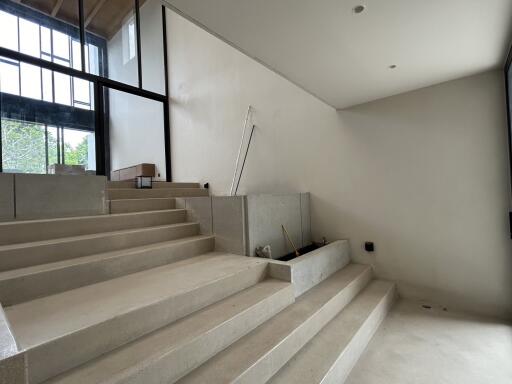 Modern staircase with glass wall