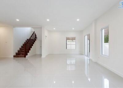 Open space living room with staircase