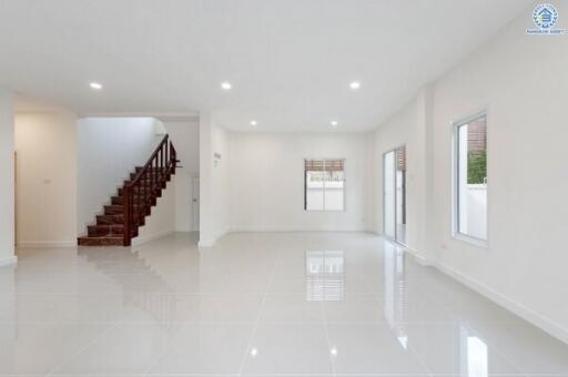 Open space living room with staircase