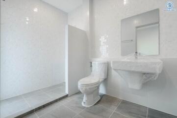 Modern and spacious bathroom with tiled flooring