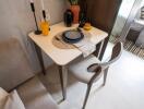 Compact dining setup with seating for two