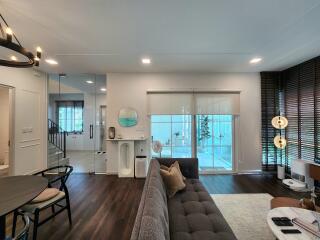 Modern living room with large windows and contemporary decor