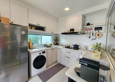 Modern kitchen with appliances and decor