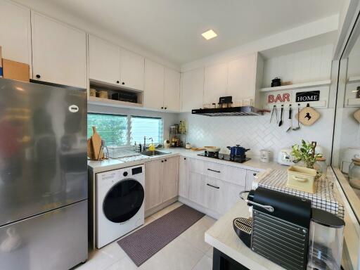 Modern kitchen with appliances and decor