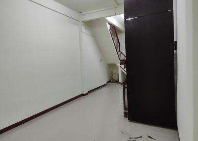 Empty hallway with staircase