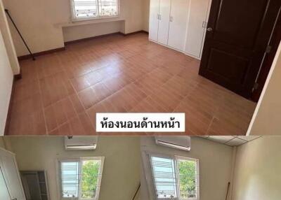 Bedroom with tiled flooring and wardrobe