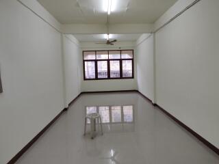 Empty living room with large window