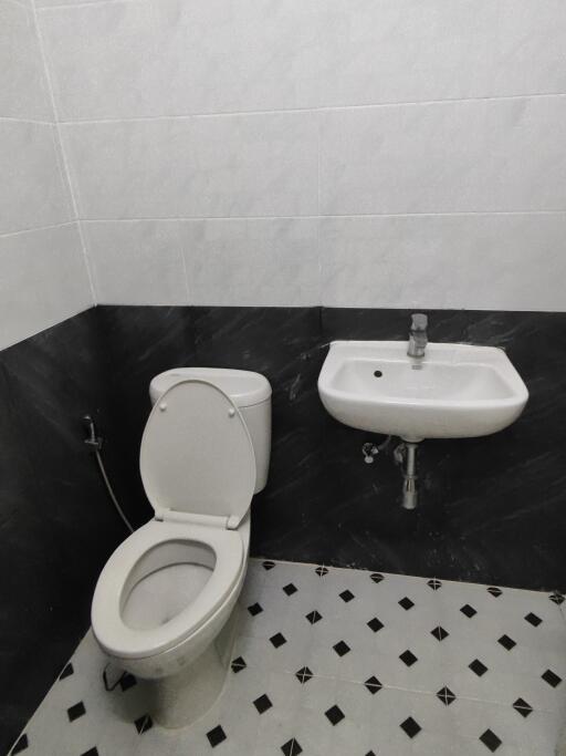 Bathroom with toilet and sink