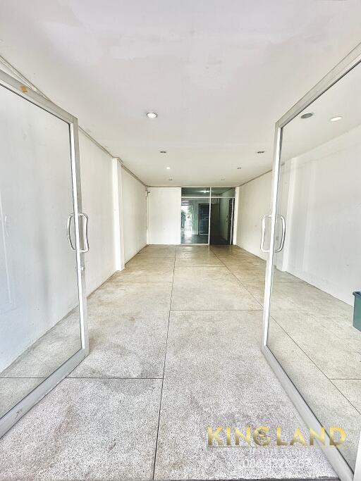 Empty interior space with glass doors