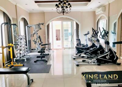 Home gym with various fitness equipment