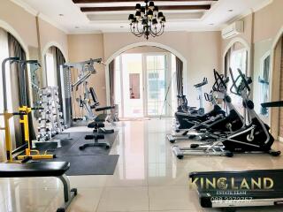 Home gym with various fitness equipment