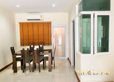 Modern dining area with table and chairs