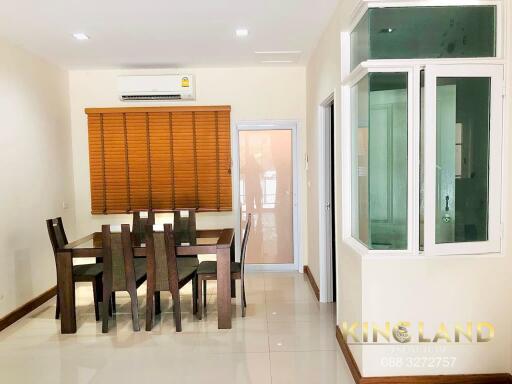 Modern dining area with table and chairs