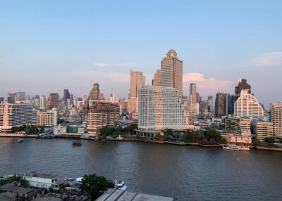 View of city skyline with river