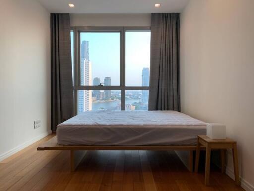 Minimalist bedroom with city view