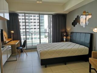 Modern bedroom with balcony view